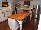 Reclaimed wood countertop, Heart pine, 3/8” bead edge with butchers wax food grade finish. Installed in Waxhaw , North Carolina.